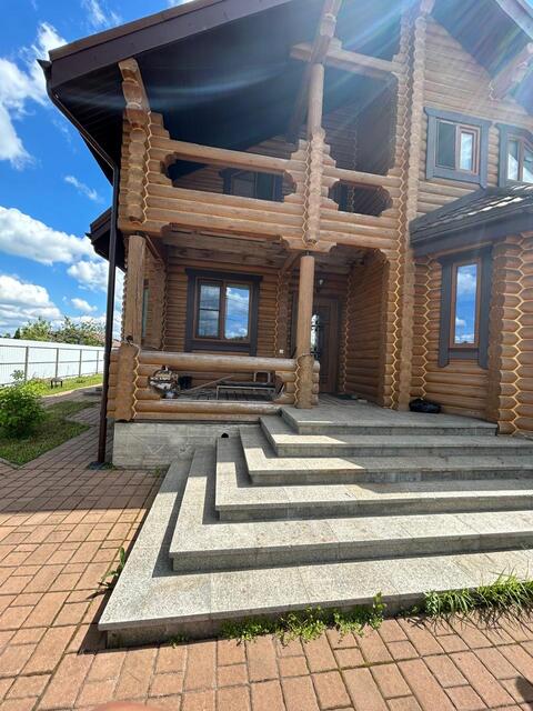 Кованые перила для крыльца бревенчатого дома